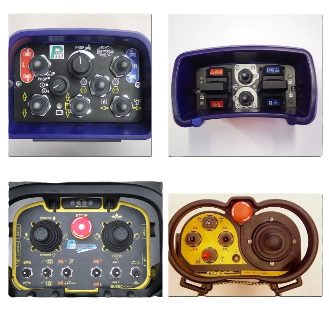 Vier verschiedene Fernbedienungen mit Tasten und Joysticks für technische Geräte in unterschiedlichen Designs.
